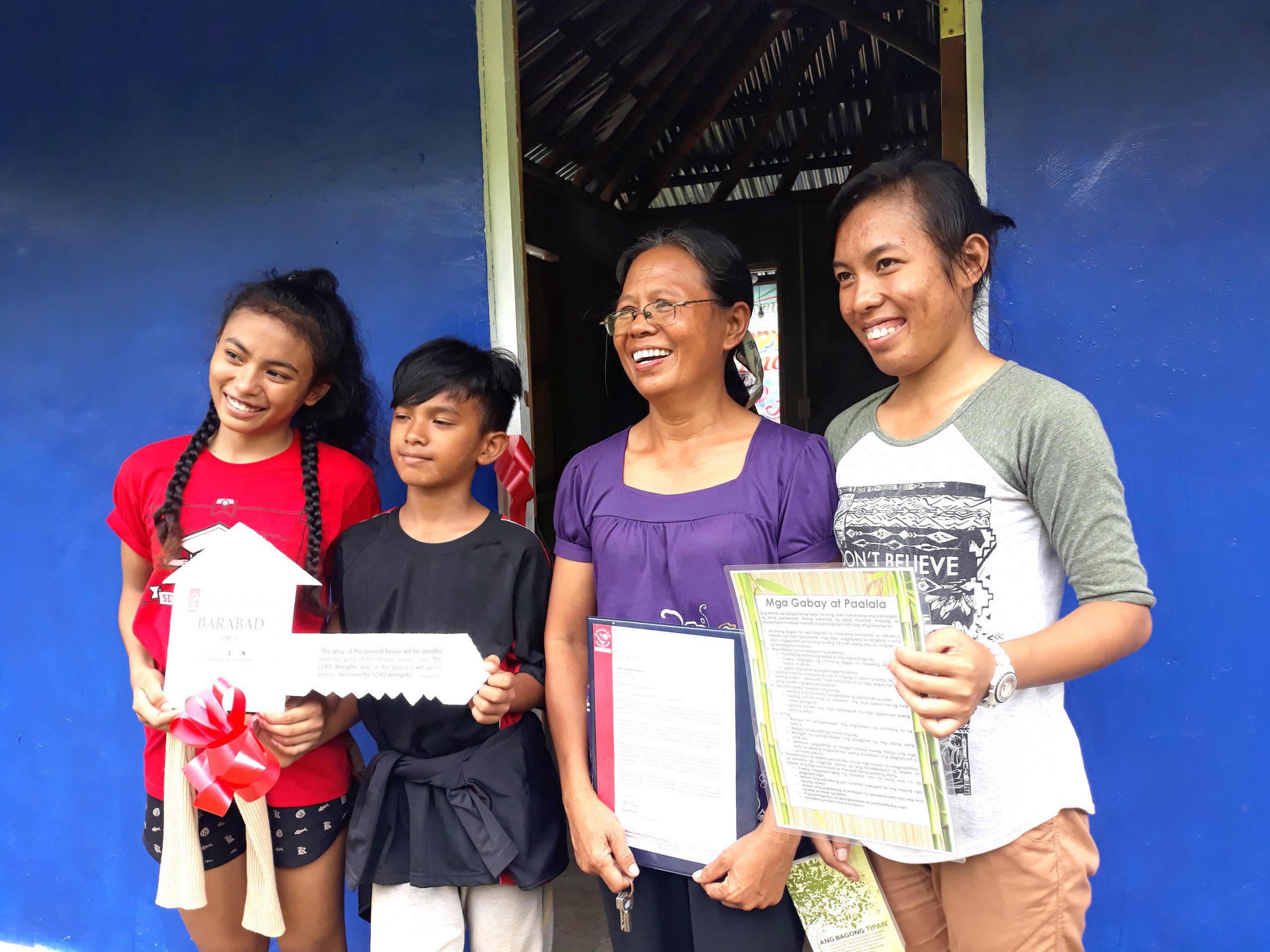 16 families receive new houses at Operation Blessing’s Community of Hope in Tacloban City