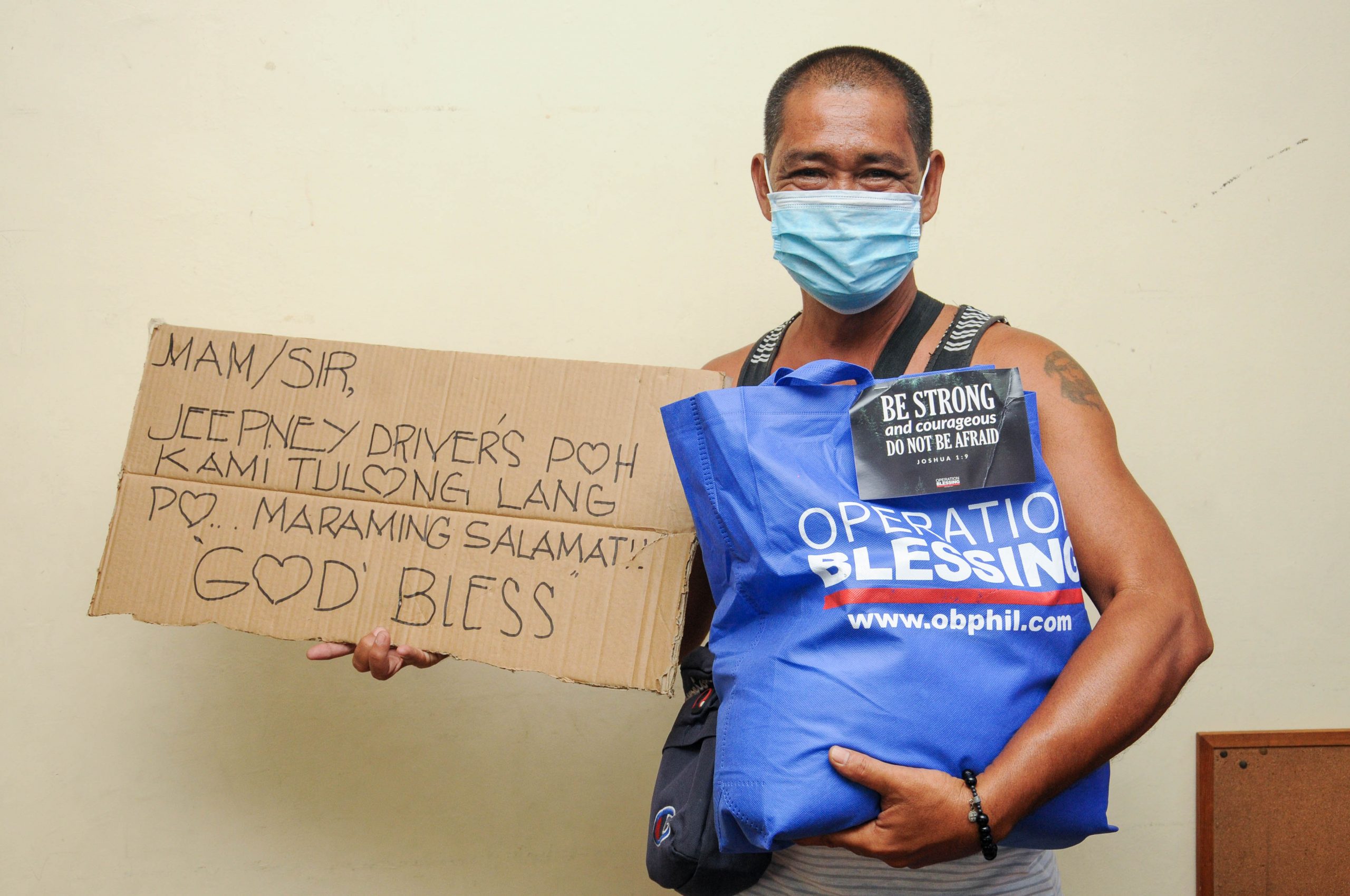 Medel and other suffering jeepney drivers received relief bags from OB
